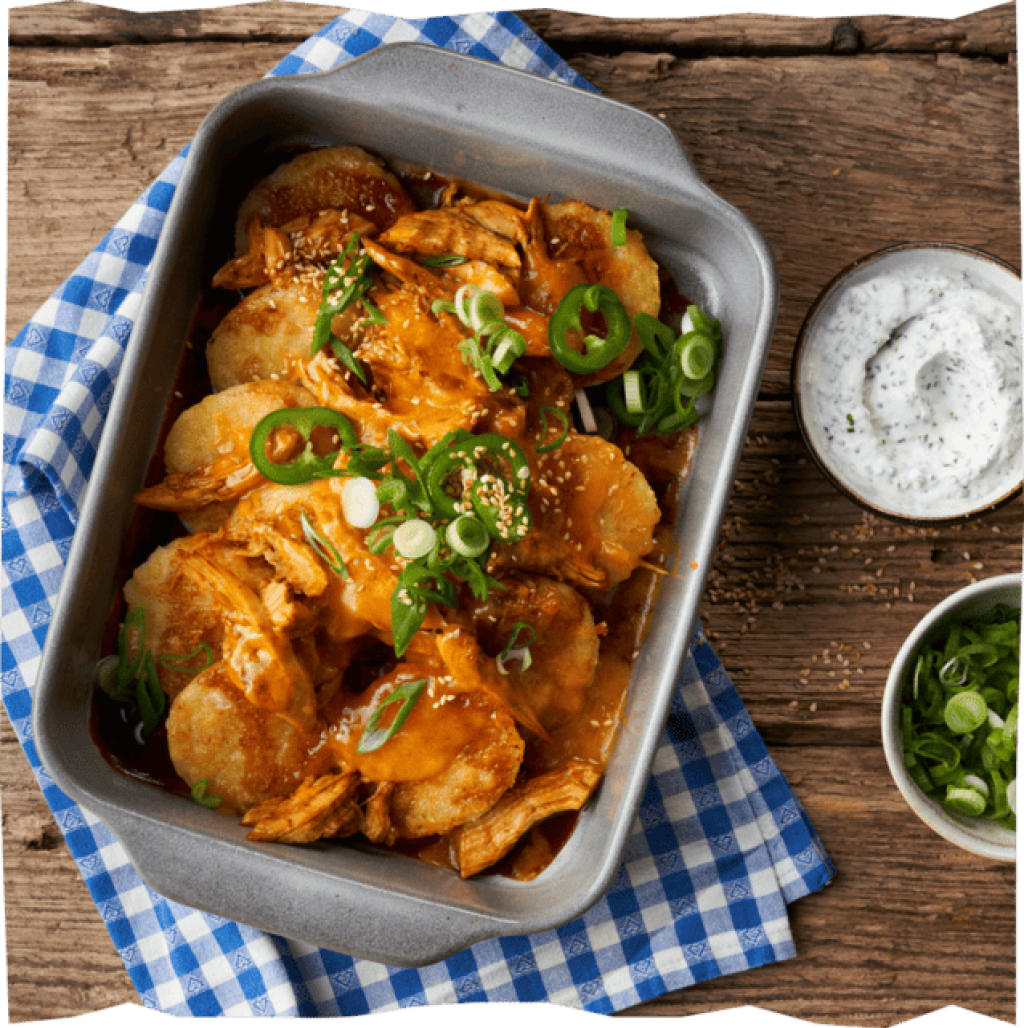 Kartoffelkloß mit Pulled Hähnchen.