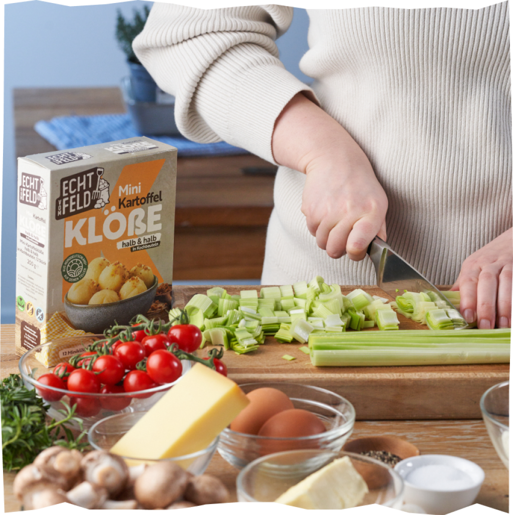 Backofen vorheizen und Lauch schneiden.