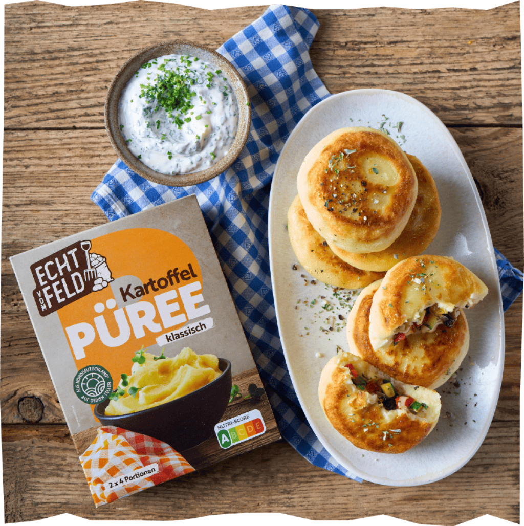 Kartoffelküchlein aus Echt vom Feld Kartoffelpürree servieren.